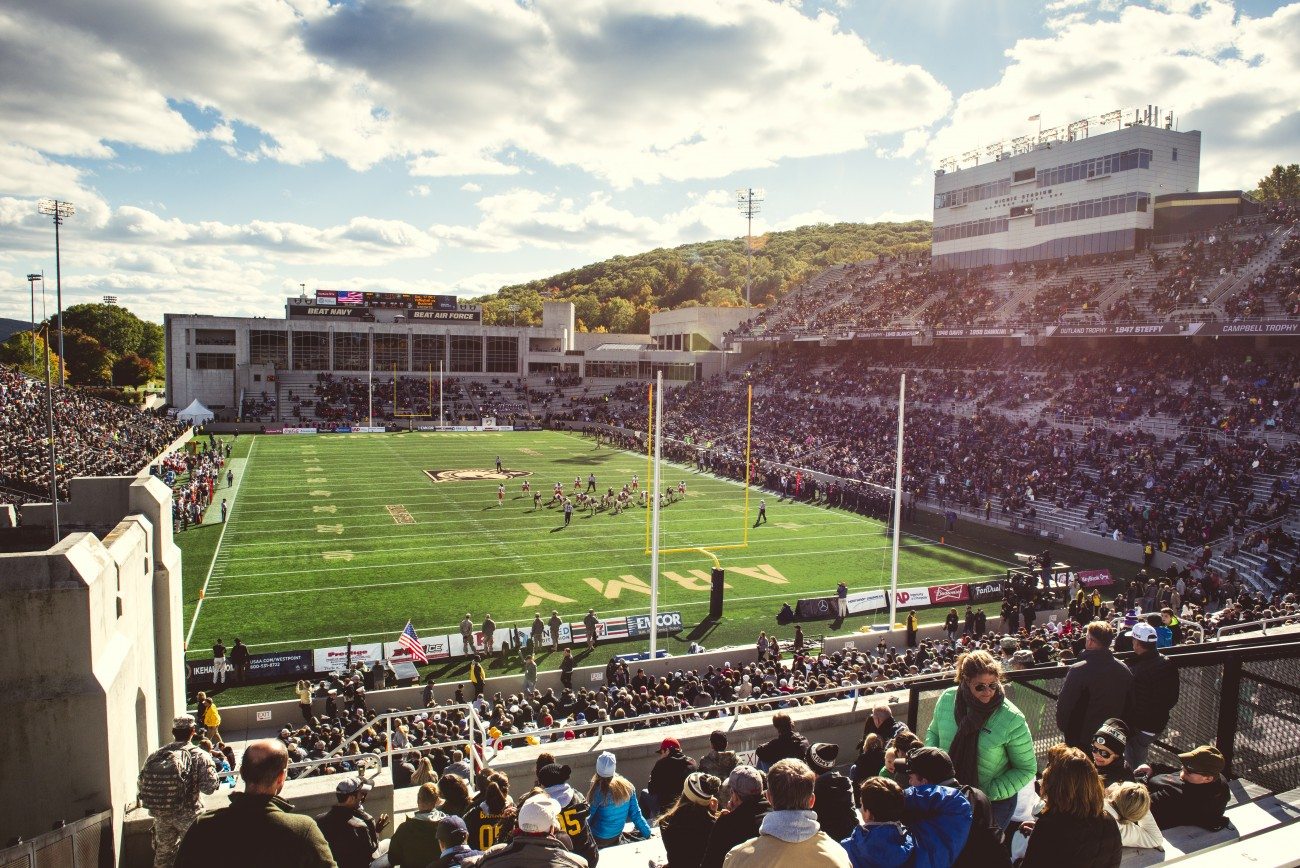 Fans cheering on Army football