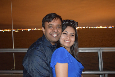 Couple posing for the camera celebrating New Years Eve