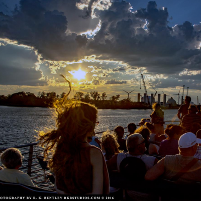 Passengers watching the sunset from the ferry